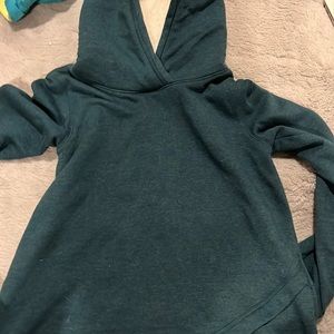 teal fluffy hooded sweatshirt